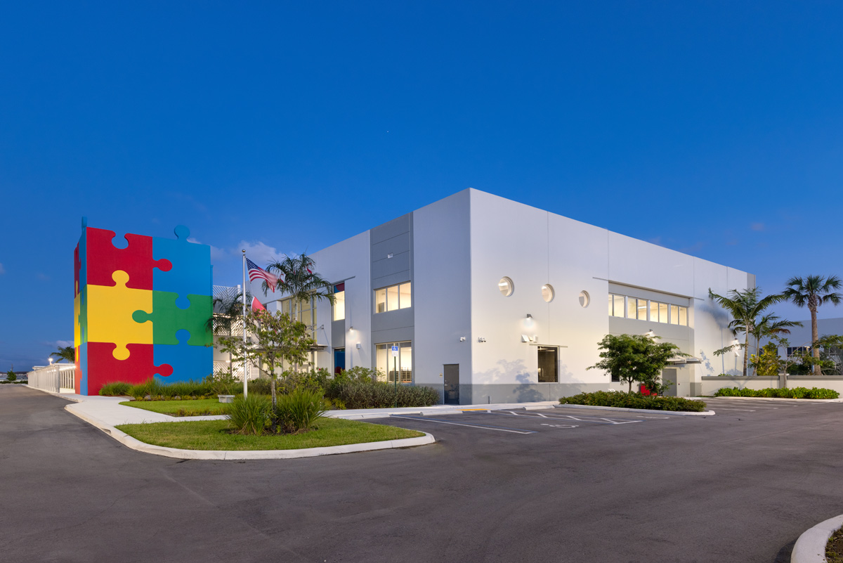 Architectural dusk view of the South Florida Autism Charter School  in Miami FL.